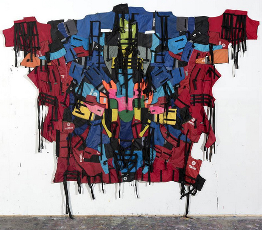 Image credit: Ben Quilty, Teeth, 2016, thread, eyelets, refugee life vests, 350.0 x 460.0 cm