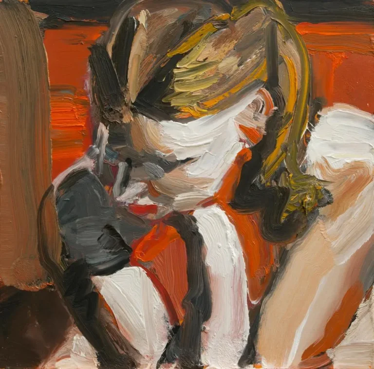 Woman with hand under chin