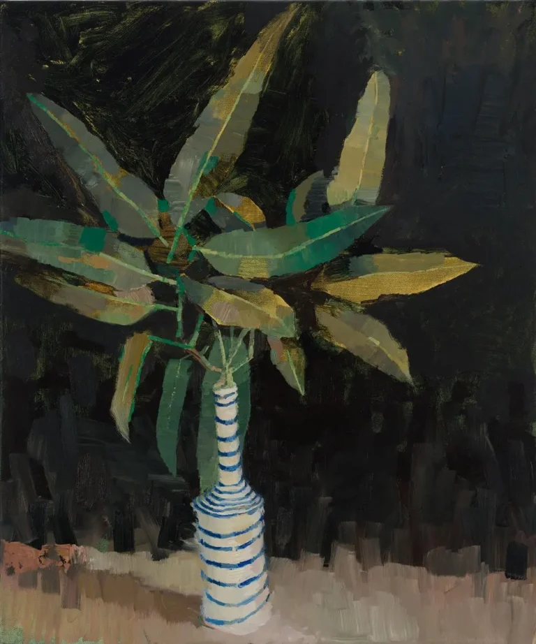 Gum leaves in a striped vase